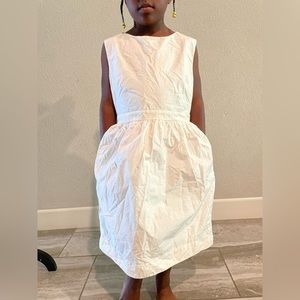 Too cute white/ivory dress for size XS. Has pockets & beautiful fabric texture